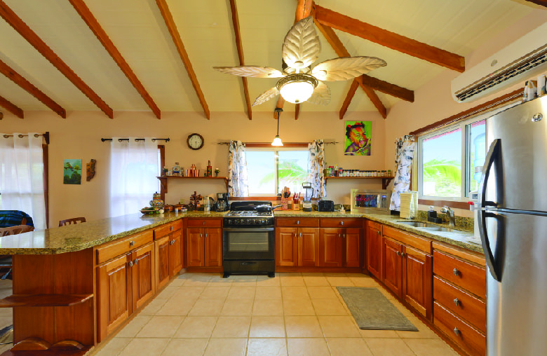 Spacious Granite Counter Kitchen with Garden View